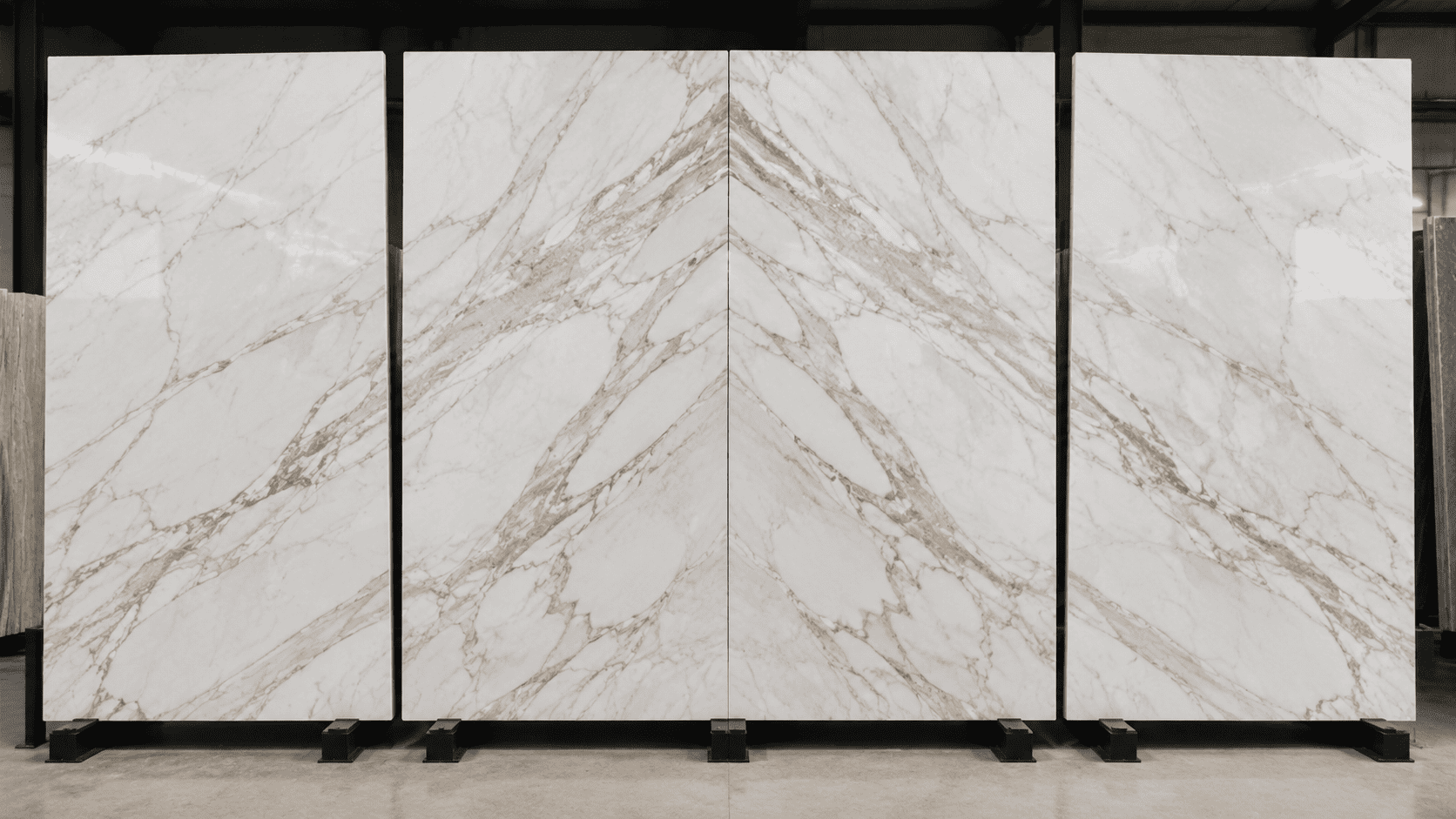 Consecutive marble slabs arranged for vein matching and bookmatch application